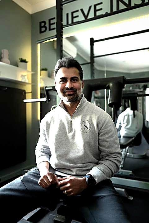 Vinay, founder and head coach at Synergy Training and Health, in the McKinnon studio