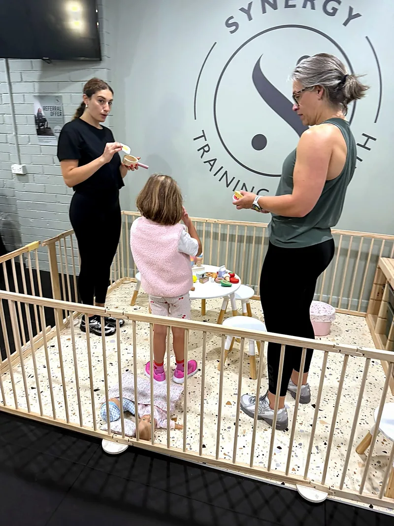 The playpen on the Synergy studio floor, in sight of the training area, McKinnon